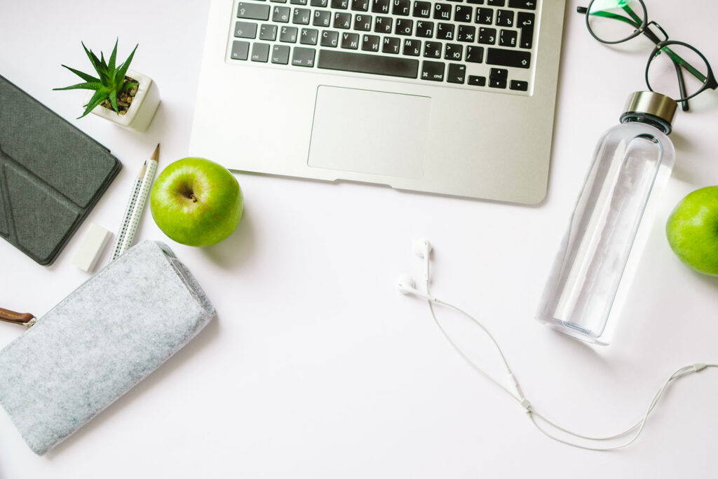 Creative Office table for healthy person with laptop, pencils, w
